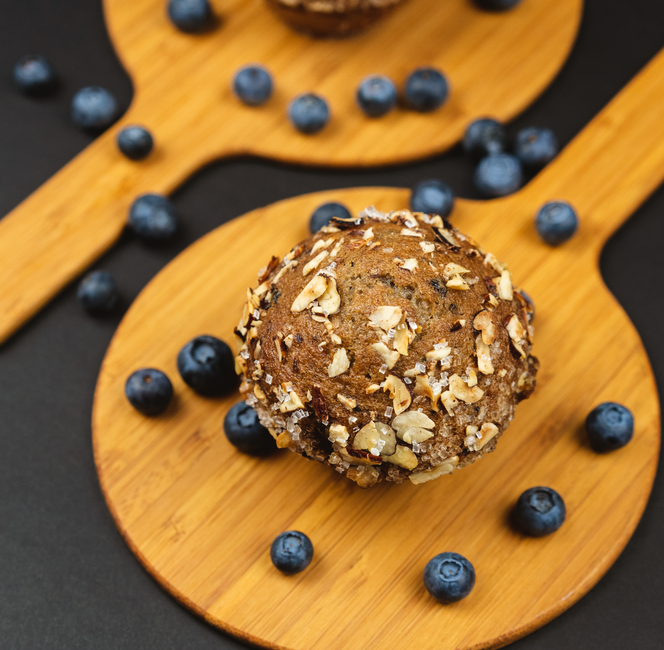 Bakery-style blueberry muffins with domed, sugared tops