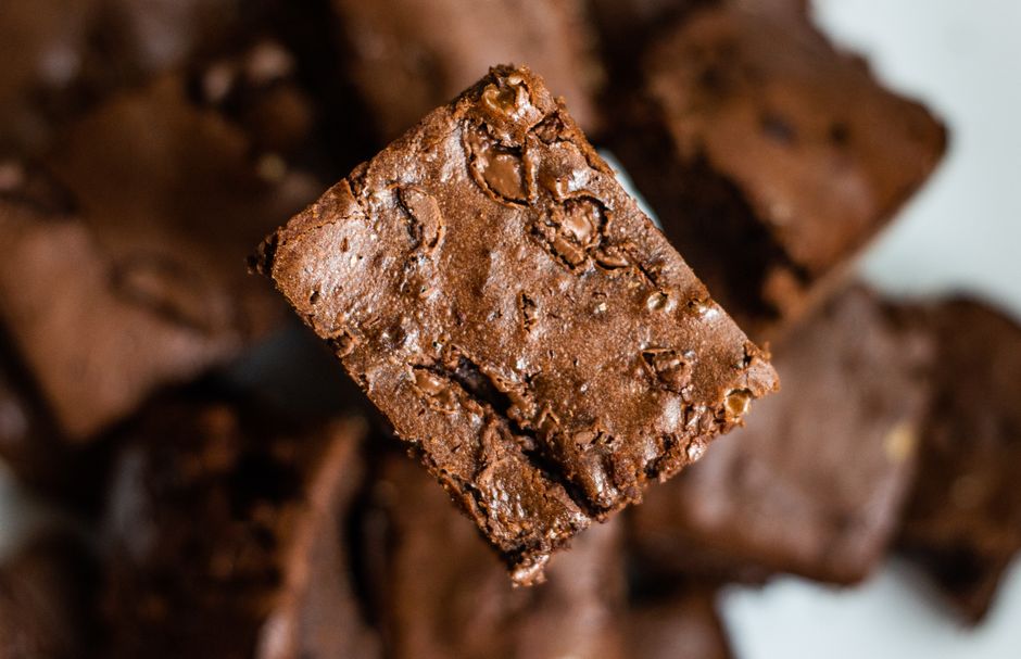 Fudgy brownies with a crackly top cut into squares