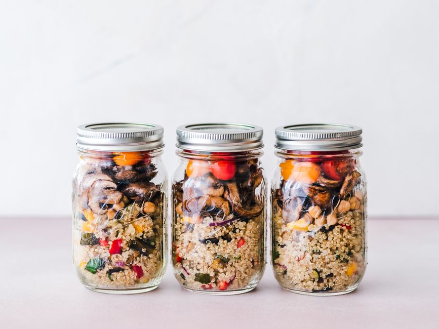 A quinoa power bowl with roasted vegetables, chickpeas, and greens