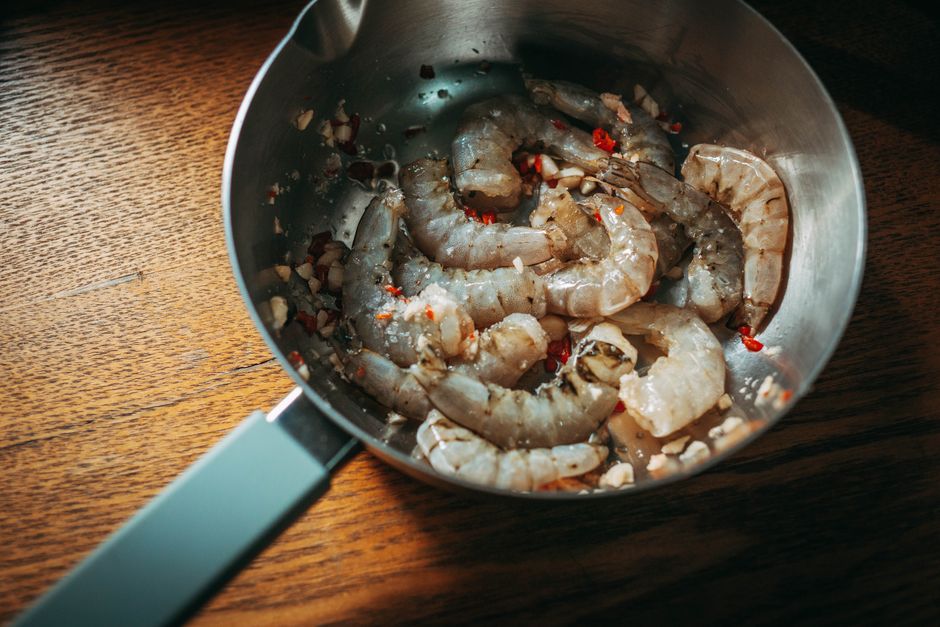 Ingredients for garlic butter shrimp laid out on a counter
