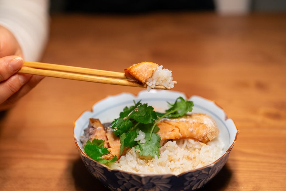 Honey garlic salmon served over steamed rice with vegetables