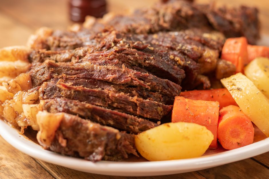 Pot roast and vegetables stored in a glass meal prep container