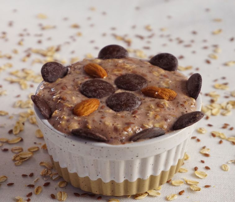 Baked oats ramekin fresh out of the oven with golden top