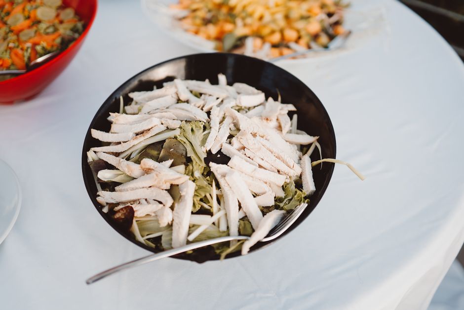 bowl of creamy chicken salad with celery and herbs