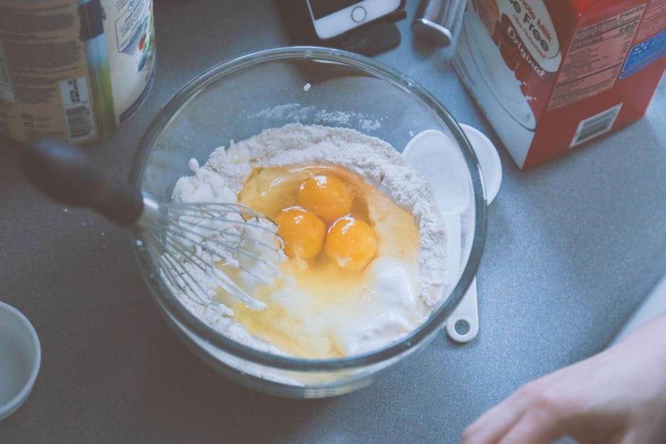 Blender with smooth pancake batter made from cottage cheese and eggs